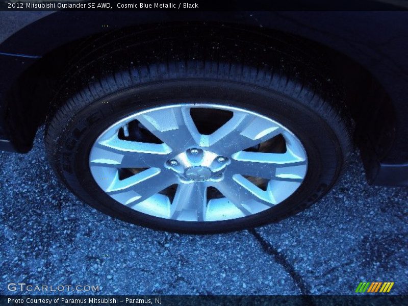 Cosmic Blue Metallic / Black 2012 Mitsubishi Outlander SE AWD