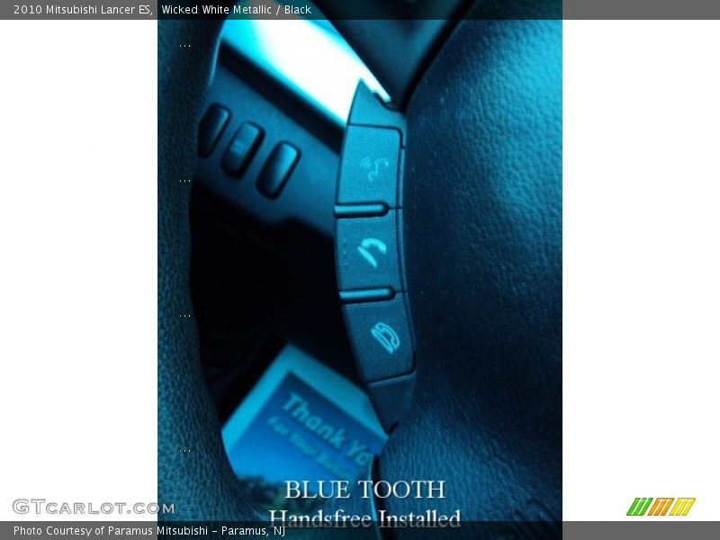 Wicked White Metallic / Black 2010 Mitsubishi Lancer ES