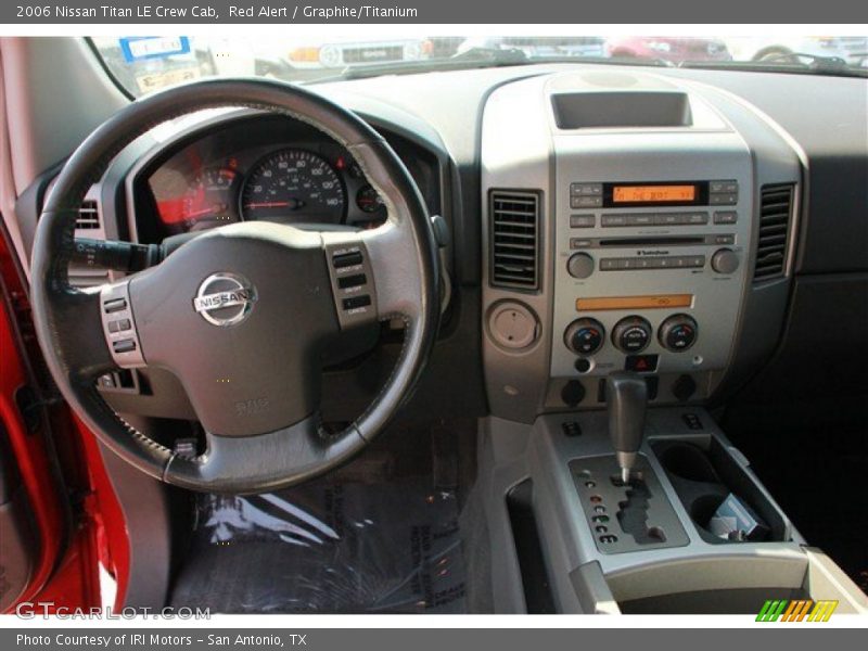 Red Alert / Graphite/Titanium 2006 Nissan Titan LE Crew Cab