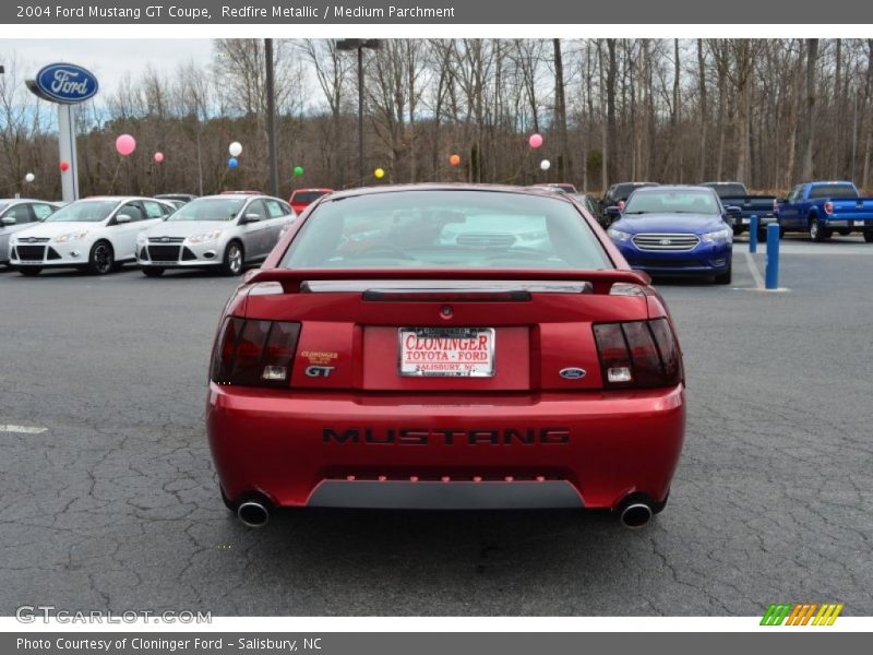Redfire Metallic / Medium Parchment 2004 Ford Mustang GT Coupe