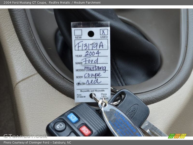 Redfire Metallic / Medium Parchment 2004 Ford Mustang GT Coupe
