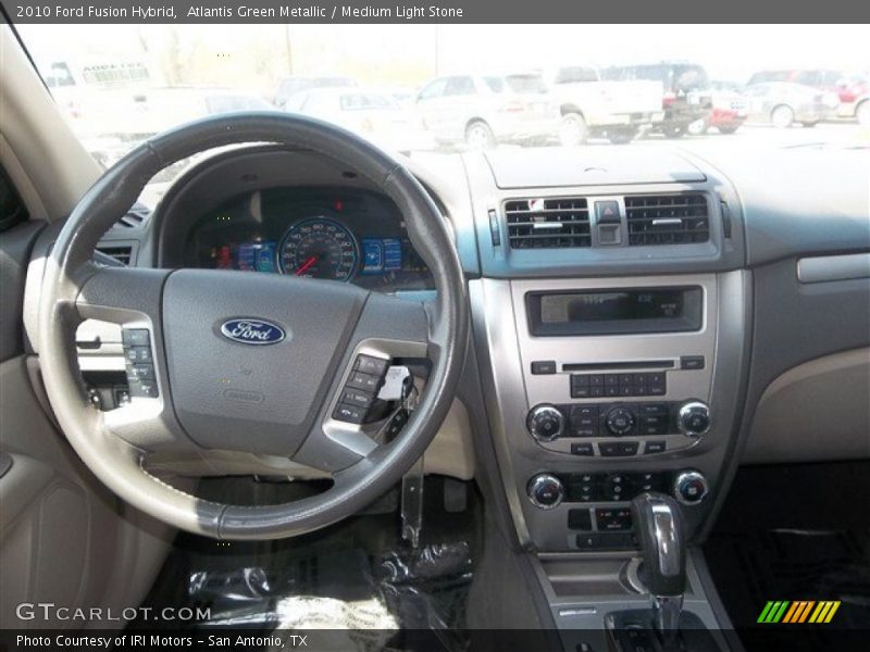 Atlantis Green Metallic / Medium Light Stone 2010 Ford Fusion Hybrid