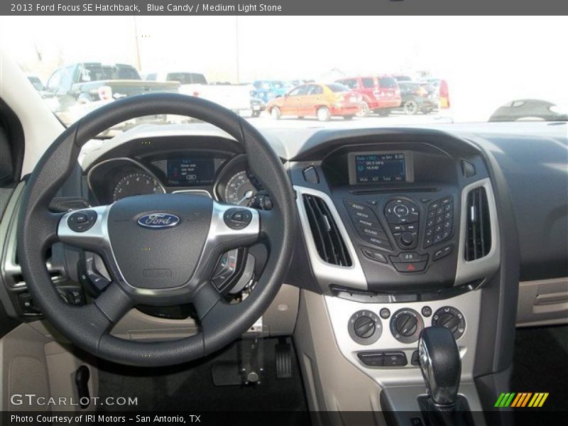Blue Candy / Medium Light Stone 2013 Ford Focus SE Hatchback