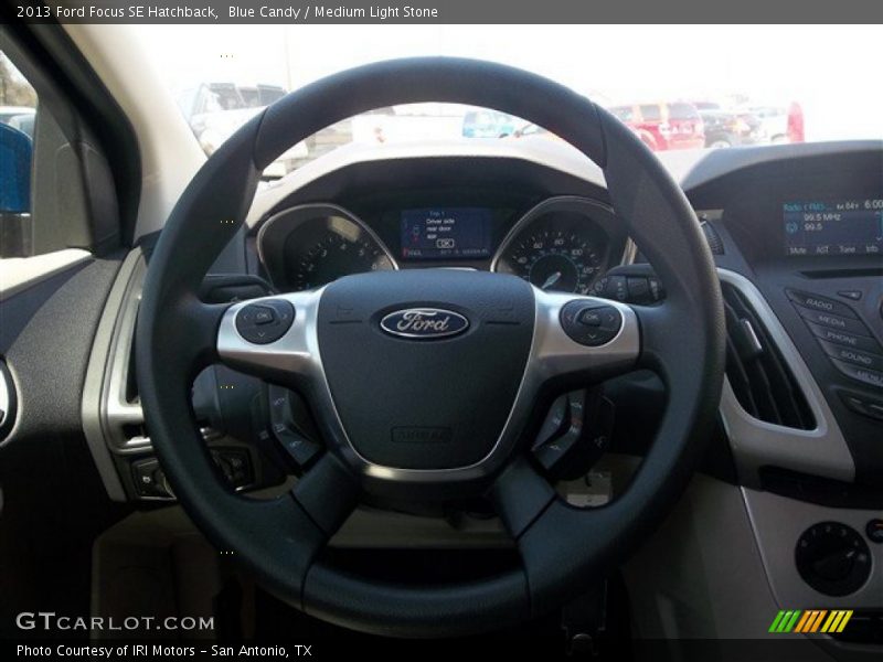 Blue Candy / Medium Light Stone 2013 Ford Focus SE Hatchback