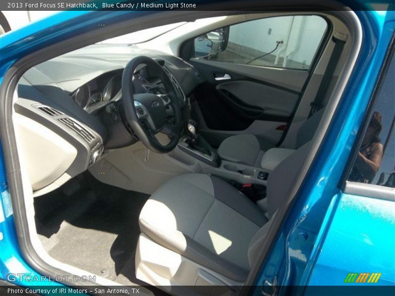 Blue Candy / Medium Light Stone 2013 Ford Focus SE Hatchback