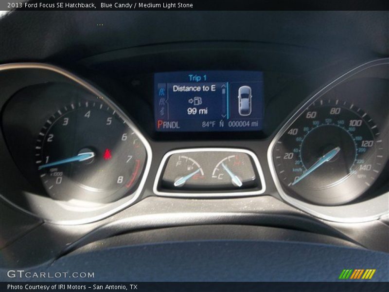 Blue Candy / Medium Light Stone 2013 Ford Focus SE Hatchback
