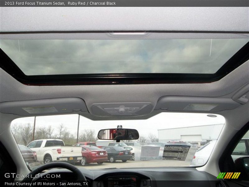 Ruby Red / Charcoal Black 2013 Ford Focus Titanium Sedan