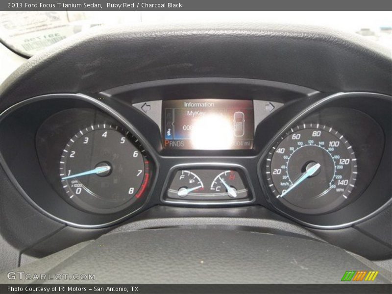 Ruby Red / Charcoal Black 2013 Ford Focus Titanium Sedan