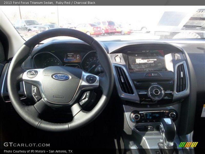 Ruby Red / Charcoal Black 2013 Ford Focus Titanium Sedan