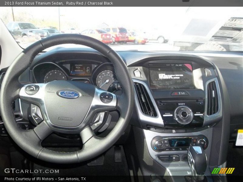 Ruby Red / Charcoal Black 2013 Ford Focus Titanium Sedan