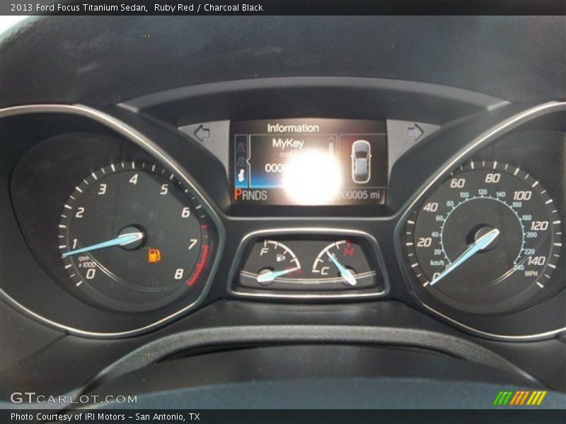 Ruby Red / Charcoal Black 2013 Ford Focus Titanium Sedan