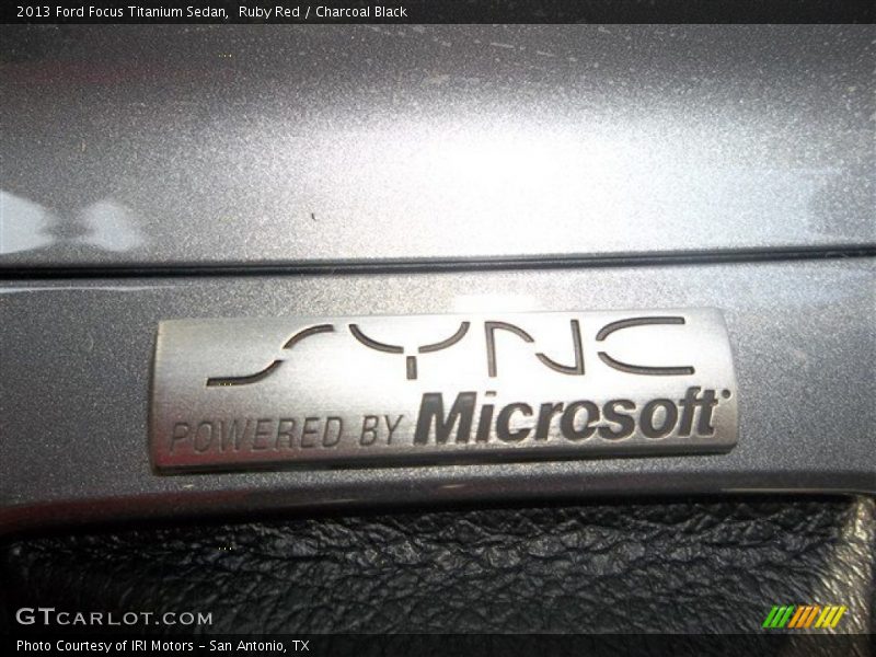 Ruby Red / Charcoal Black 2013 Ford Focus Titanium Sedan