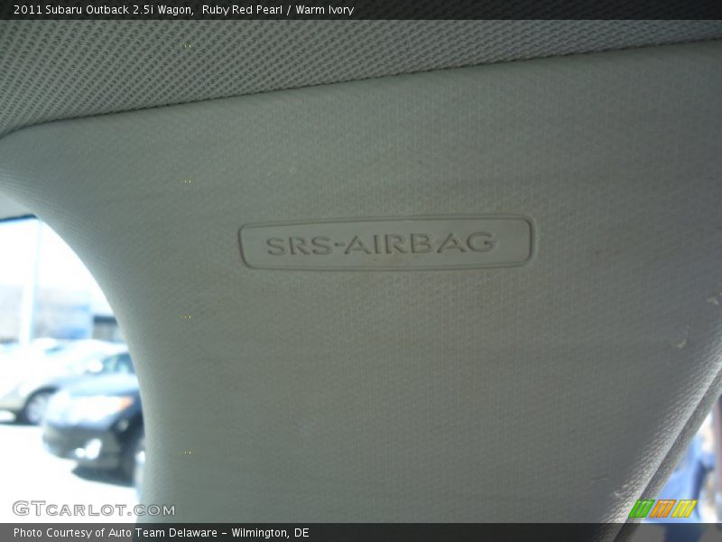 Ruby Red Pearl / Warm Ivory 2011 Subaru Outback 2.5i Wagon