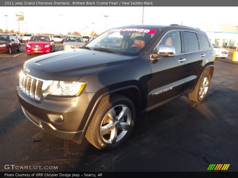 Brilliant Black Crystal Pearl / New Saddle/Black 2011 Jeep Grand Cherokee Overland