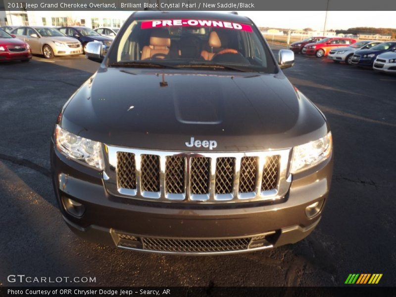 Brilliant Black Crystal Pearl / New Saddle/Black 2011 Jeep Grand Cherokee Overland