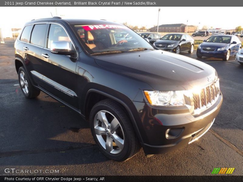 Brilliant Black Crystal Pearl / New Saddle/Black 2011 Jeep Grand Cherokee Overland