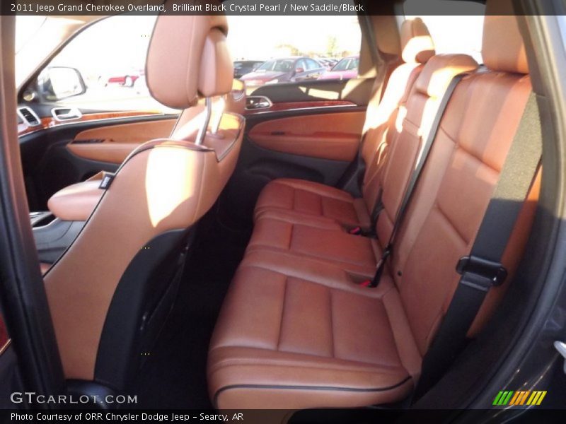 Brilliant Black Crystal Pearl / New Saddle/Black 2011 Jeep Grand Cherokee Overland
