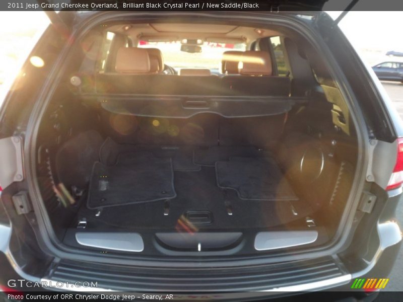 Brilliant Black Crystal Pearl / New Saddle/Black 2011 Jeep Grand Cherokee Overland