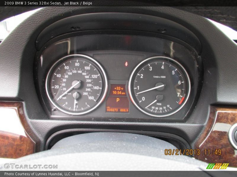 Jet Black / Beige 2009 BMW 3 Series 328xi Sedan