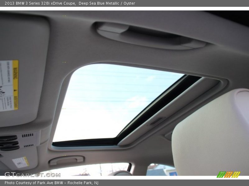 Deep Sea Blue Metallic / Oyster 2013 BMW 3 Series 328i xDrive Coupe