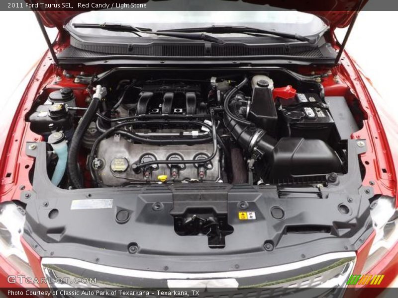 Red Candy / Light Stone 2011 Ford Taurus SEL