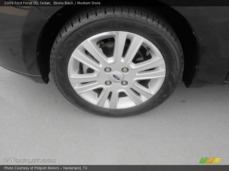 Ebony Black / Medium Stone 2009 Ford Focus SEL Sedan