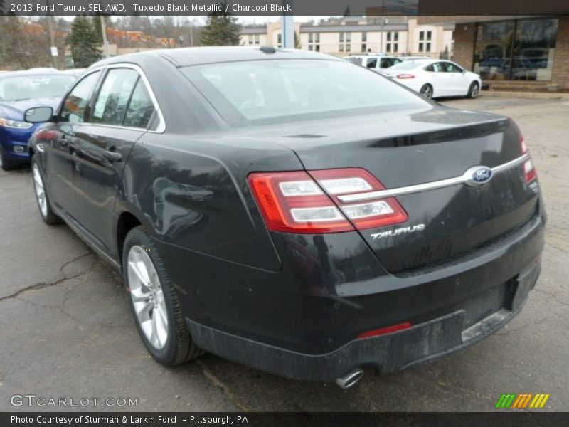 Tuxedo Black Metallic / Charcoal Black 2013 Ford Taurus SEL AWD