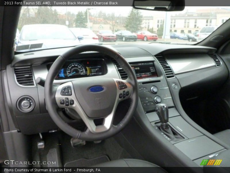 Tuxedo Black Metallic / Charcoal Black 2013 Ford Taurus SEL AWD