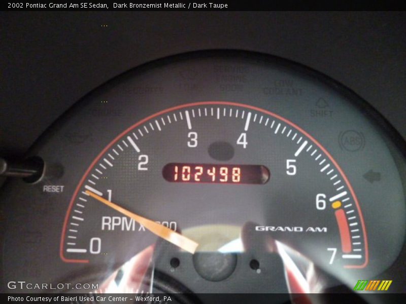 Dark Bronzemist Metallic / Dark Taupe 2002 Pontiac Grand Am SE Sedan