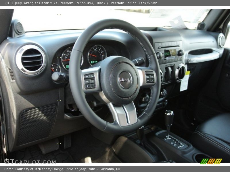 Black / Freedom Edition Black/Silver 2013 Jeep Wrangler Oscar Mike Freedom Edition 4x4