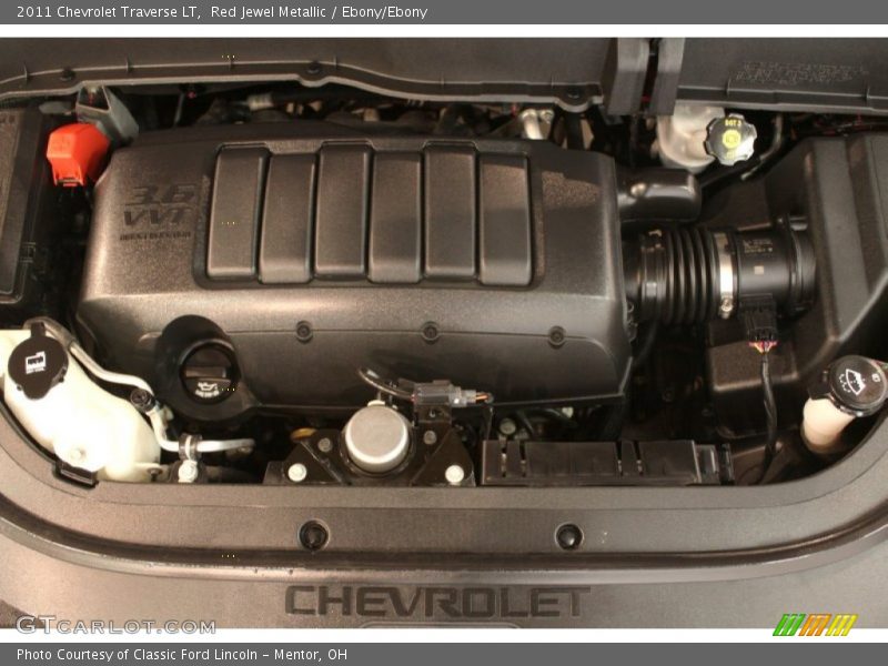 Red Jewel Metallic / Ebony/Ebony 2011 Chevrolet Traverse LT