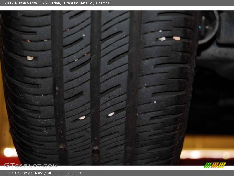 Titanium Metallic / Charcoal 2012 Nissan Versa 1.6 SL Sedan