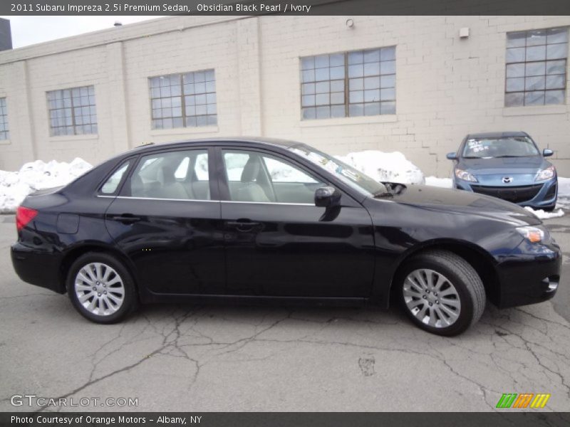 Obsidian Black Pearl / Ivory 2011 Subaru Impreza 2.5i Premium Sedan