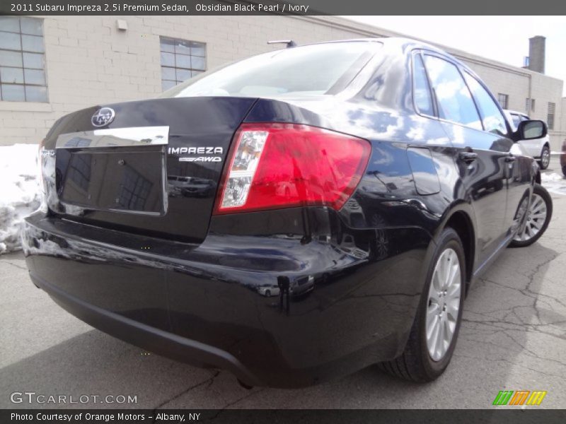 Obsidian Black Pearl / Ivory 2011 Subaru Impreza 2.5i Premium Sedan