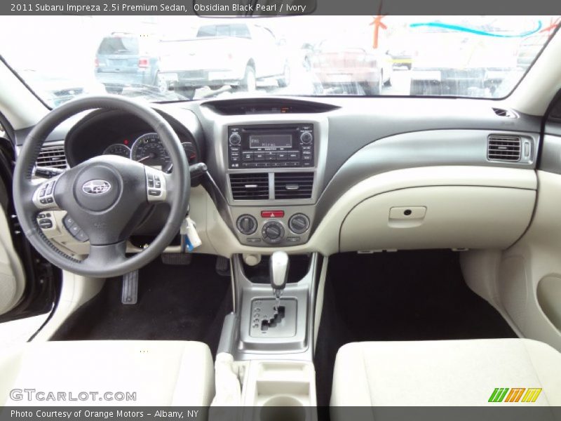 Obsidian Black Pearl / Ivory 2011 Subaru Impreza 2.5i Premium Sedan