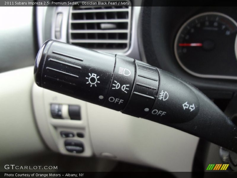 Obsidian Black Pearl / Ivory 2011 Subaru Impreza 2.5i Premium Sedan