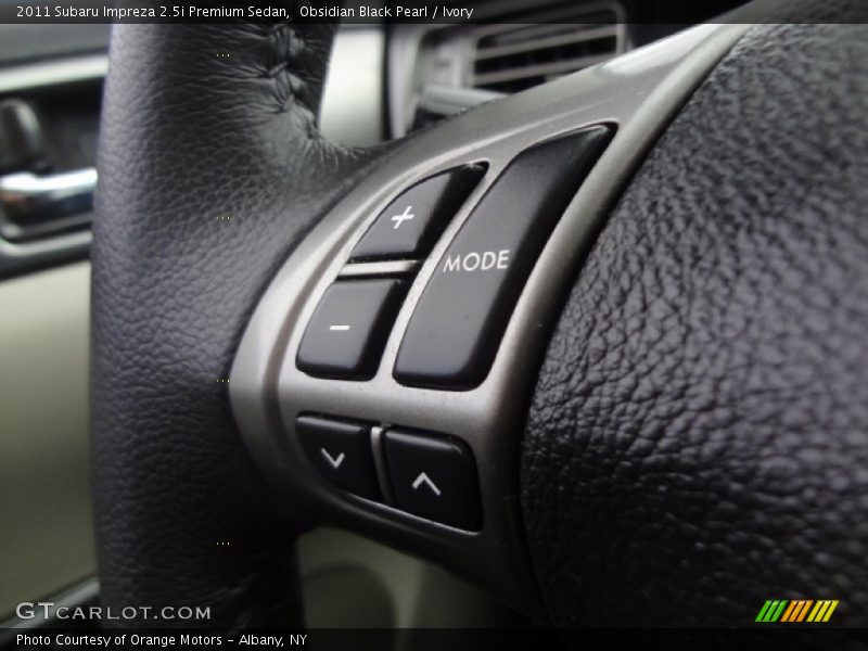 Obsidian Black Pearl / Ivory 2011 Subaru Impreza 2.5i Premium Sedan