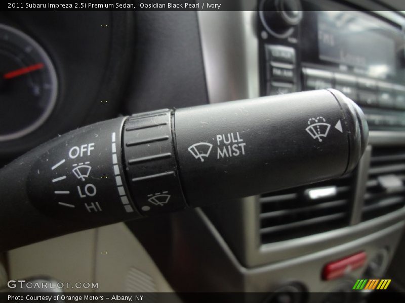 Obsidian Black Pearl / Ivory 2011 Subaru Impreza 2.5i Premium Sedan