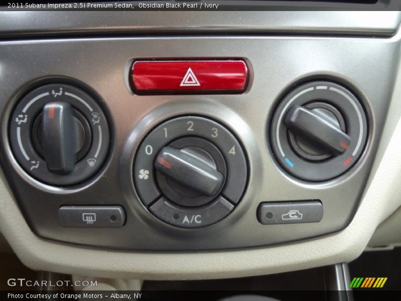 Obsidian Black Pearl / Ivory 2011 Subaru Impreza 2.5i Premium Sedan