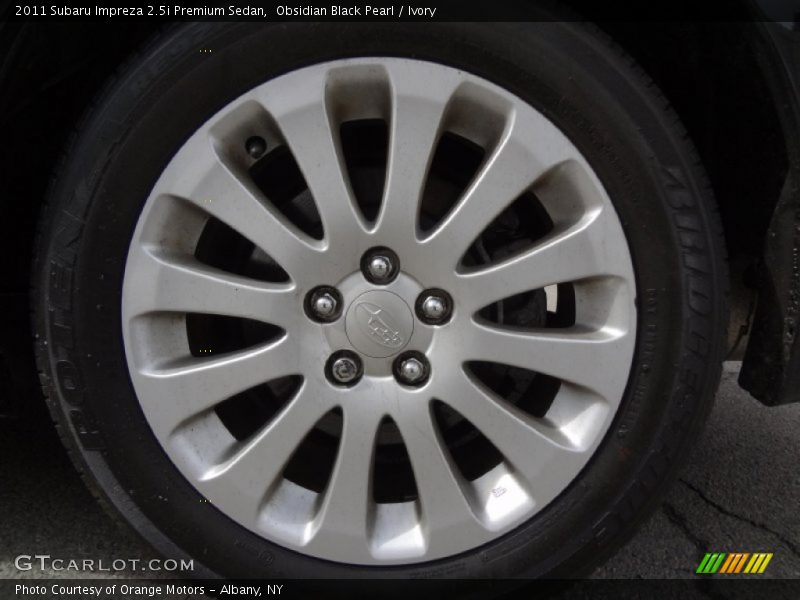 Obsidian Black Pearl / Ivory 2011 Subaru Impreza 2.5i Premium Sedan
