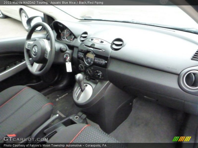 Dashboard of 2011 MAZDA2 Touring