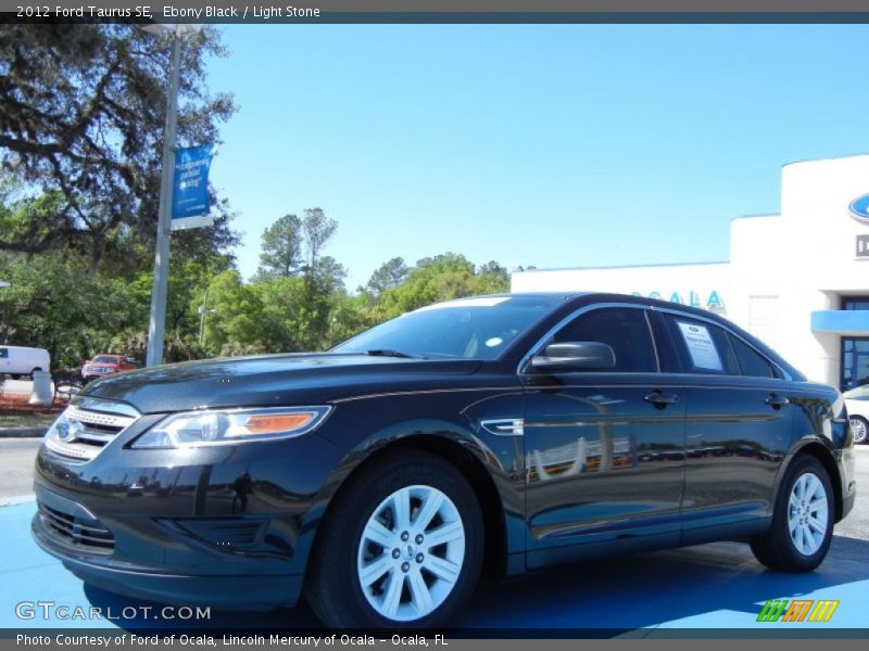 Ebony Black / Light Stone 2012 Ford Taurus SE