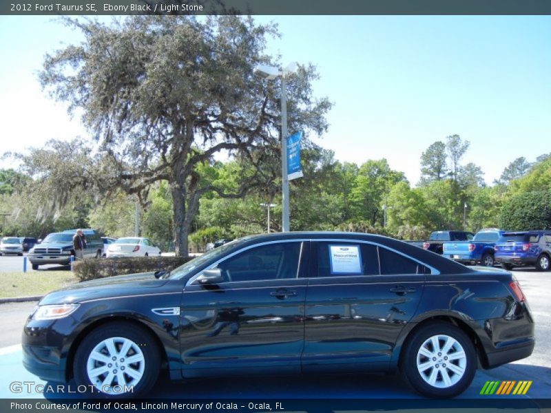 Ebony Black / Light Stone 2012 Ford Taurus SE