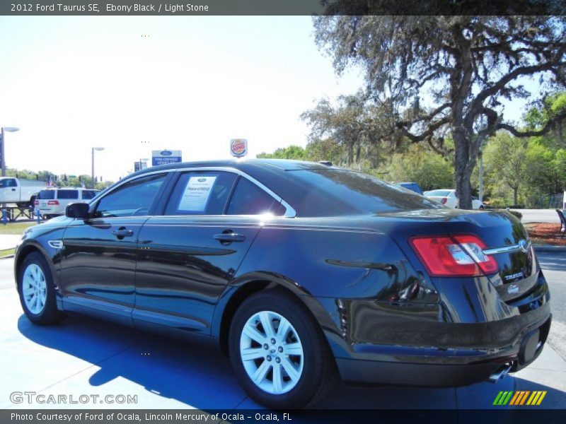 Ebony Black / Light Stone 2012 Ford Taurus SE