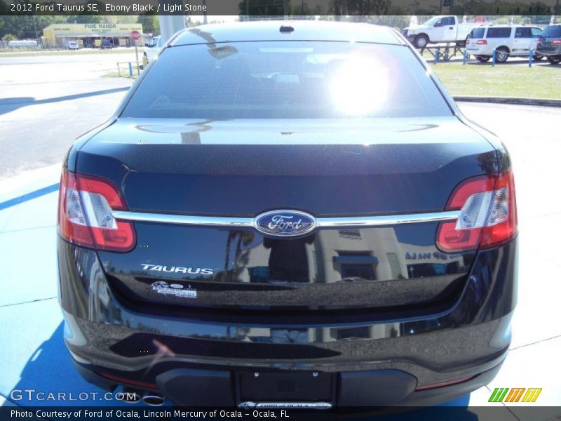 Ebony Black / Light Stone 2012 Ford Taurus SE