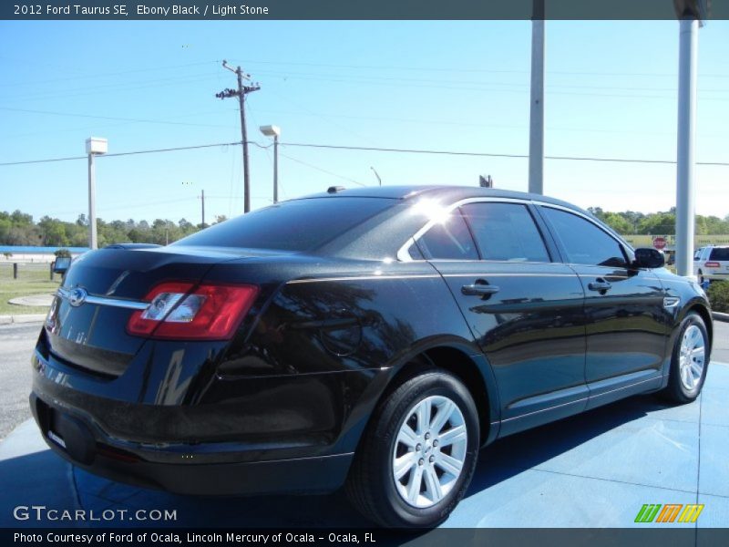 Ebony Black / Light Stone 2012 Ford Taurus SE