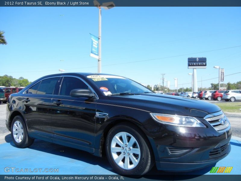 Ebony Black / Light Stone 2012 Ford Taurus SE