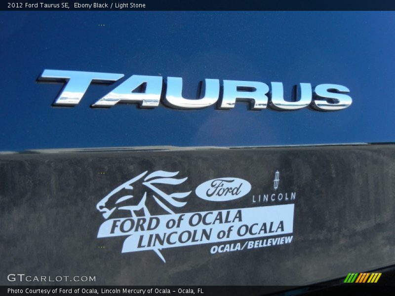 Ebony Black / Light Stone 2012 Ford Taurus SE