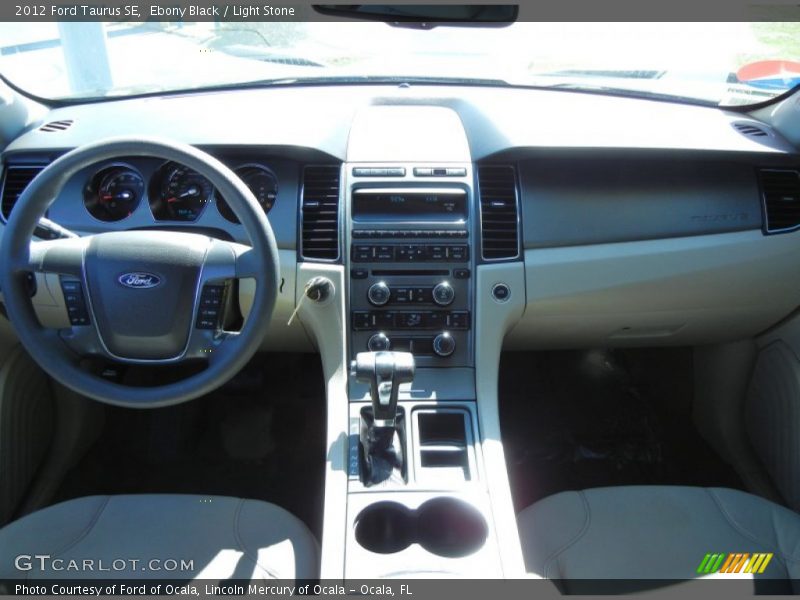 Ebony Black / Light Stone 2012 Ford Taurus SE