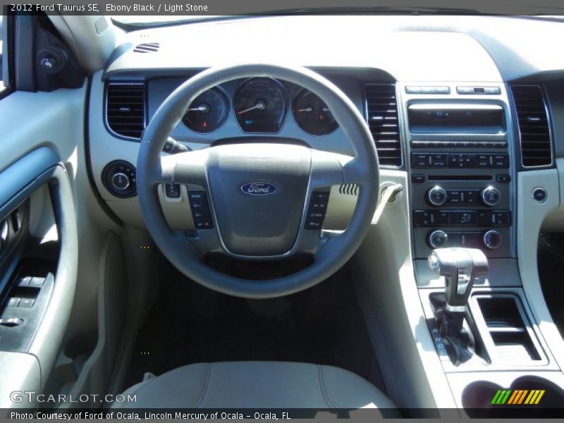 Ebony Black / Light Stone 2012 Ford Taurus SE